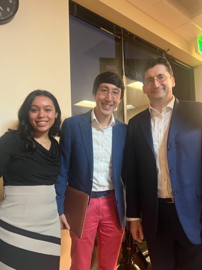 With speakers after a panel